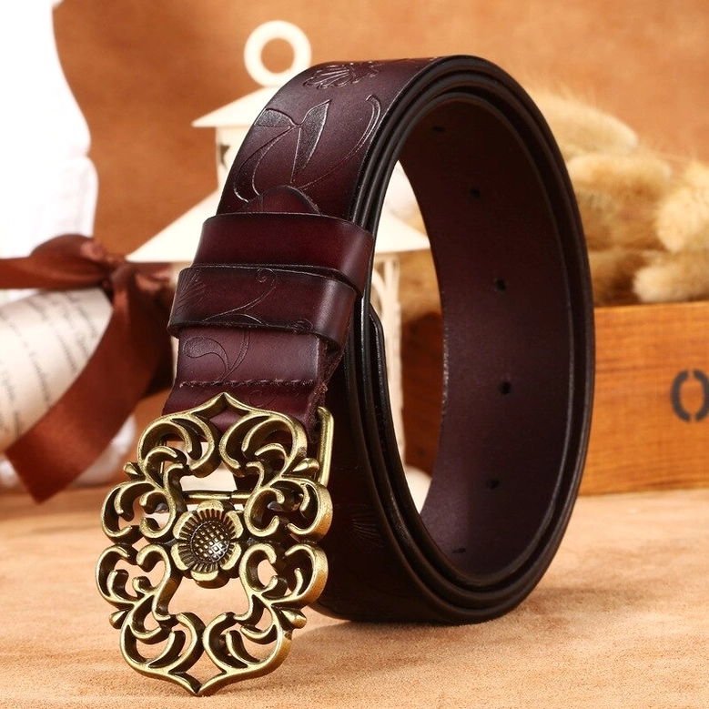 Burgundy dark reddish-brown leather gothic waist belt with embossed floral details and bronze vintage pin buckle, product detail shot
