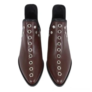 Burgundy leather ankle boots with silver eyelet rivets, front view featuring pointed toe and slip-on design
