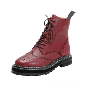 Burgundy leather gothic ankle boots with contrast stitching and heavy-duty lug sole, featuring brogue hollow-out pattern