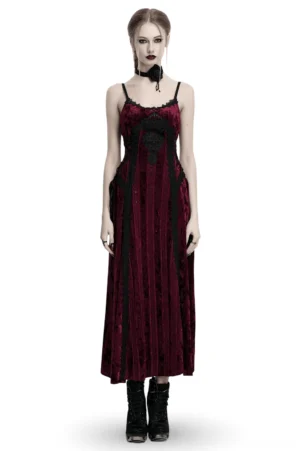 Burgundy velvet gothic slip dress front view on model, featuring lace trim and adjustable straps