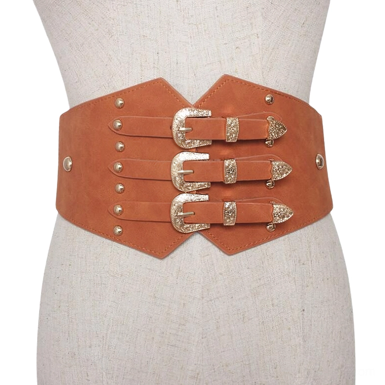 Camel tan PU leather corset belt with ornamental gold buckles and punk-inspired rivets on dress form