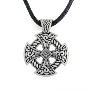 Celtic cross shield pendant with black braided cord chain, frontal view showcasing intricate carved cross design on white background