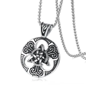 Antique silver Celtic knot pendant with stainless steel chain displayed, side profile showing ornate engraved circular design and gothic aesthetic