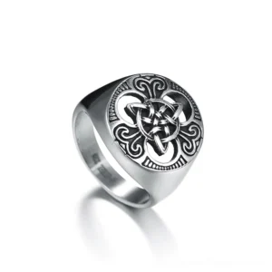 Celtic knot stainless steel signet ring three-quarter front view showing intricate engraved details