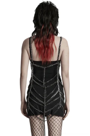 Back view of chain harness dress displaying exposed back design, layered gunmetal chains, and decorative chain tassel hem detail