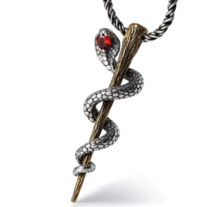 Cobra sterling silver pendant with red gemstone, detailed scaled snake design on white background
