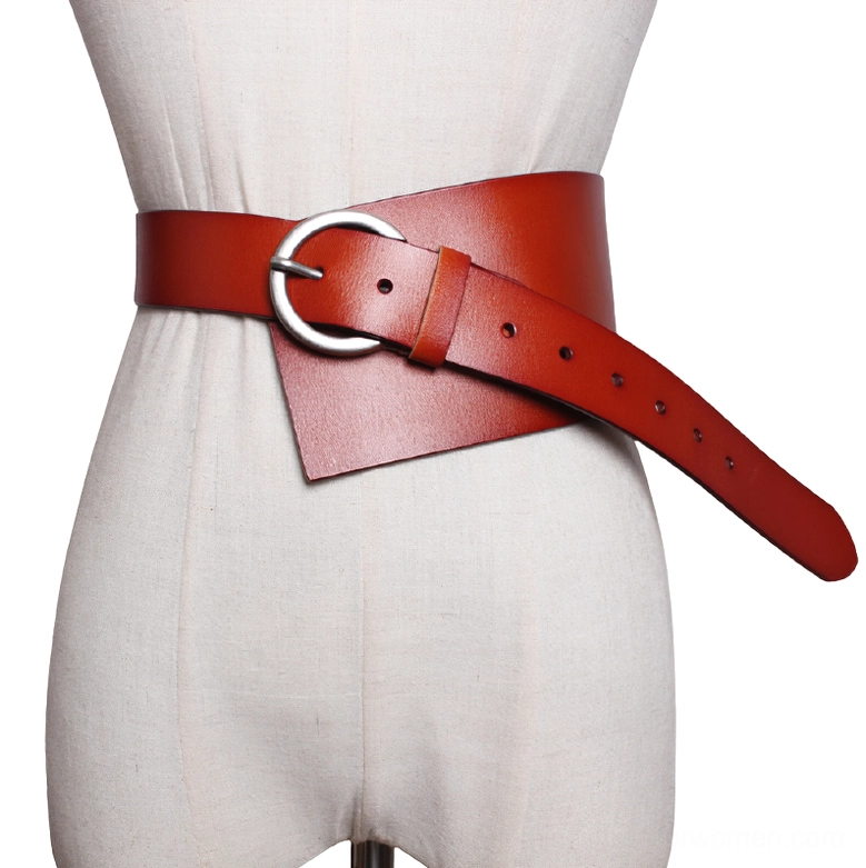 Cognac brown wide corset belt with silver buckle displayed on mannequin torso, pure white background