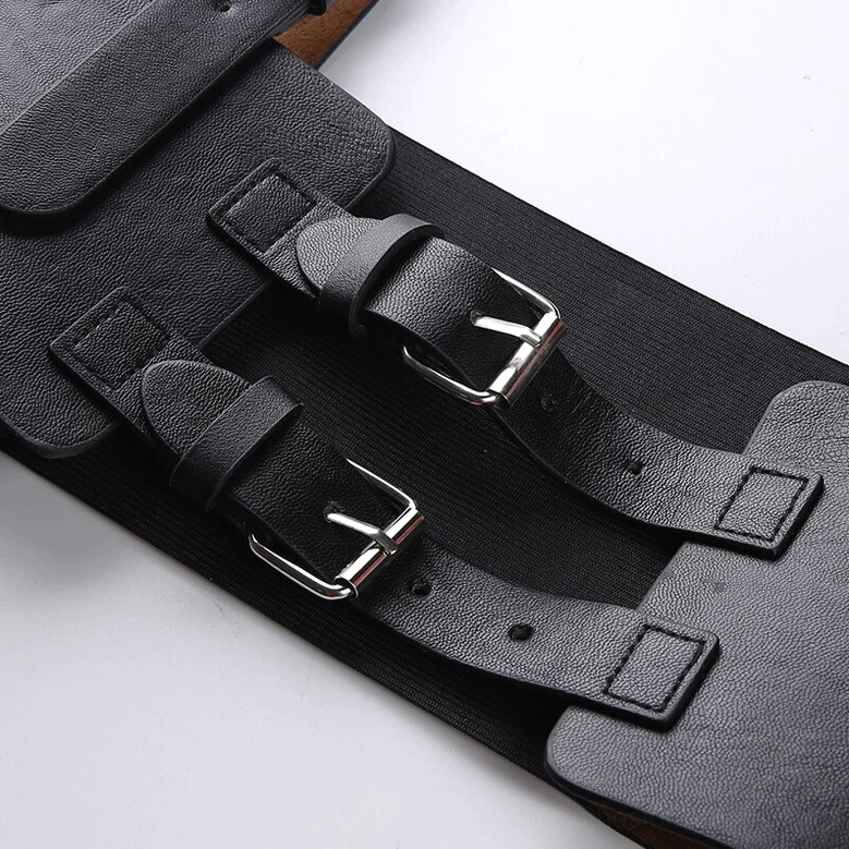 Corset belt waist section close-up - dual adjustable buckles and stitched leather details