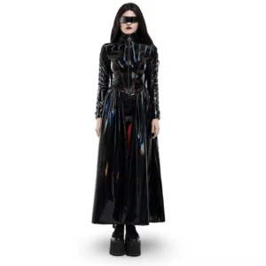 Front full-body view of holographic cyber rococo gothic long coat on model with futuristic sunglasses, white studio background, showcasing high collar and iridescent patent leather shine