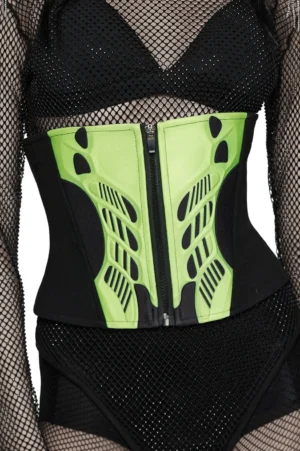 Black cyberpunk waist corset with neon green armor plating worn on female model in front view with fishnet bodysuit