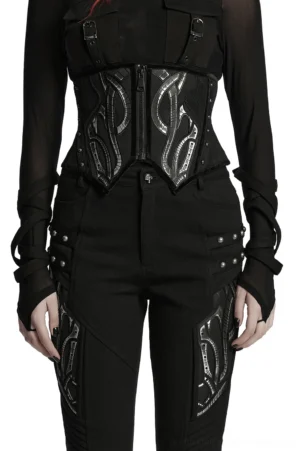 Black cyberpunk mesh corset belt with silver metal studs and rubber panels, front view on model wearing full black streetwear