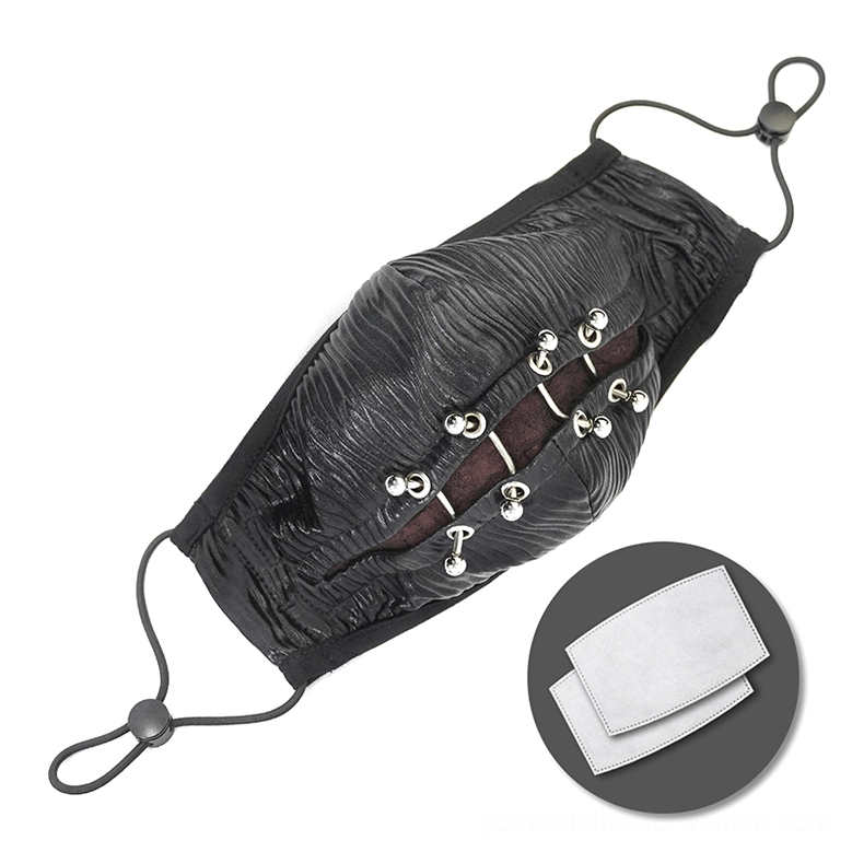 Black cyberpunk punk face mask with metal piercing details and textured leather surface, shown with extra filter pads on white studio background