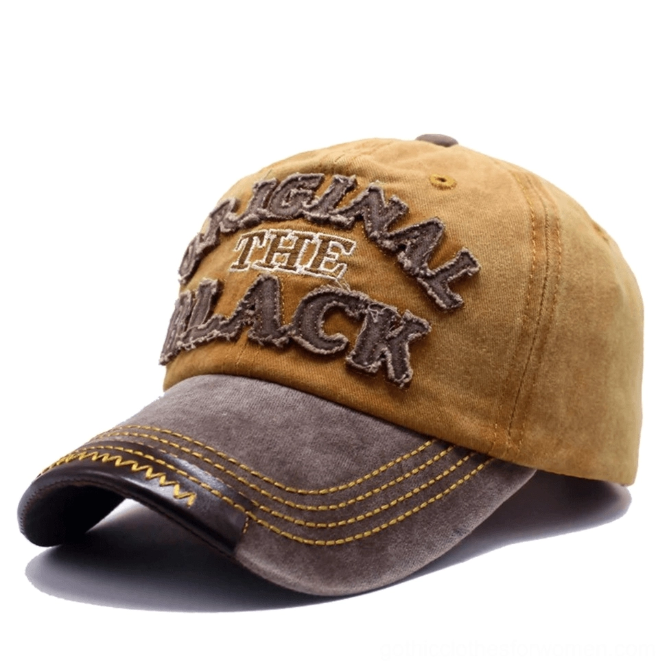 Mustard yellow and brown goth baseball cap with yellow topstitching contrast design