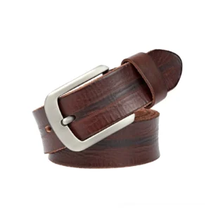 Dark brown striped vintage leather gothic belt with matte silver pin buckle, flat lay studio shot on white background