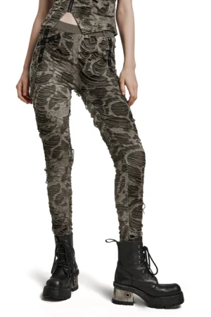 Distressed khaki gothic chain skinny trousers full-body styling on model with platform boots and cropped top - left three-quarter view