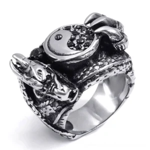 Dragon claw gothic biker ring for men, left three-quarter view showing intricate dragon design and yin-yang detail in antiqued silver stainless steel
