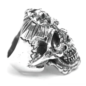 dual skull connected gothic ring left oblique view vintage silver finish