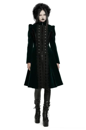 Emerald green velvet gothic coat with black ornate lace front panel and metal buttons, front full-body view on model