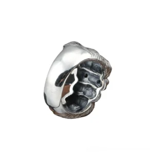 Adjustable fist skull ring side rear view displaying hollow carved interior structure and vintage silver patina finish