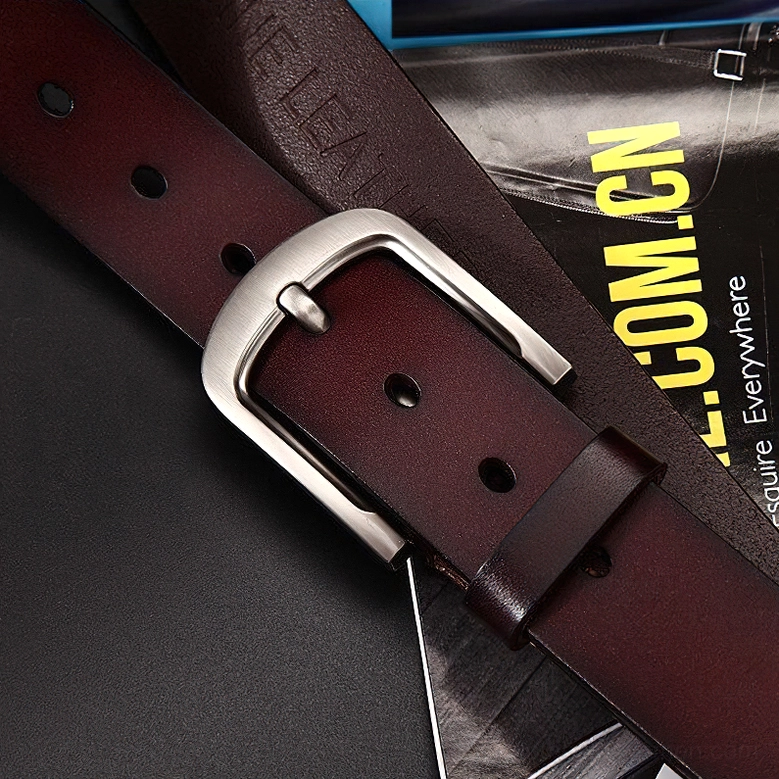Premium genuine cowskin gothic belt close-up detail view showcasing leather texture, stitching and metal buckle construction