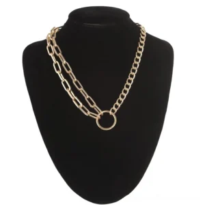 Gold layered geometric chain choker necklace with circle ring pendant, worn on black jewelry mannequin, front view showcase