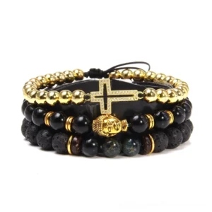 Gold-toned layered gothic bracelet set featuring natural mixed stone beads, Buddha head charm, cross accent and metallic details