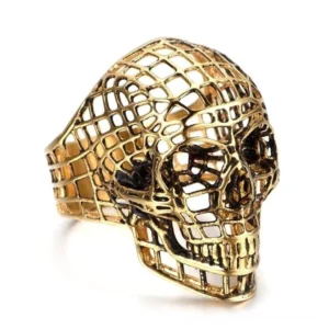 Gold hollow skull gothic biker ring - three-quarter side view with intricate grid pattern