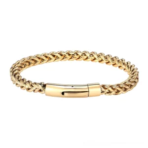 Gold tone stainless steel industrial gothic chain bracelet with polished finish and secure push clasp mechanism on white background