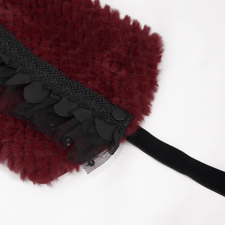 Close-up detail of wine red faux fur collar trim showing beaded accents and black ruffled mesh lace