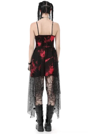 Black and wine red asymmetrical goth dress with fishnet panels and studded details, back view showcasing open back design