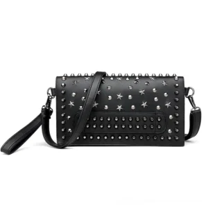 Black gothic shoulder bag with full metal star and spike stud embellishment flat lay