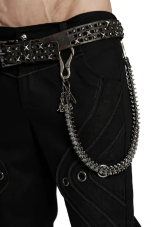 Punk metal waist pant chain with detailed chain links and charms front view on male model against white background