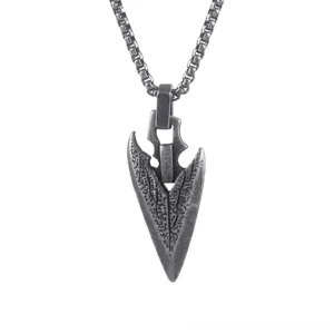 Dark silver arrowhead pendant with leaf-vein gothic texture - alternative jewelry design