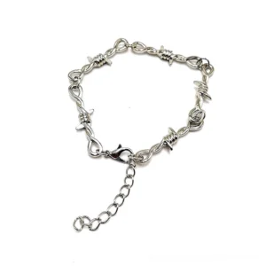 Unisex barbed wire gothic chain bracelet flat lay with lobster clasp and extension chain