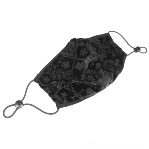 gothic baroque patterned face mask flat lay showing embossed floral details and adjustable elastic toggles
