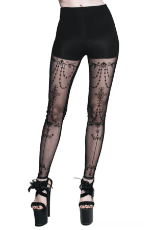 Black gothic baroque mesh leggings with chain print and transparent panels, worn on female model in full-body front view with white studio background