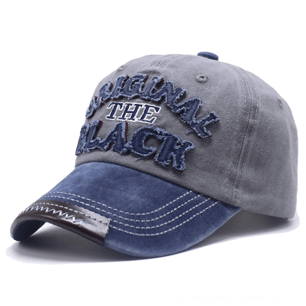 Light gray and navy blue gothic snapback with contrast stitching three-quarter view