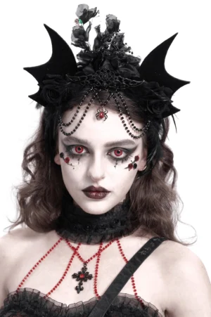 Black gothic bat crown with roses and bead chain, front view on model with dramatic gothic makeup