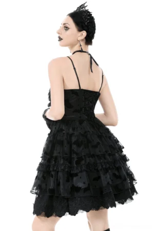 Black gothic slip dress back view showing lace-up corset closure and ruffled tiered skirt
