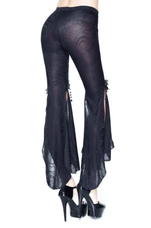 Black gothic bell-bottom trousers rear three-quarter view showing paisley jacquard texture and flared hems, styled with platform heels