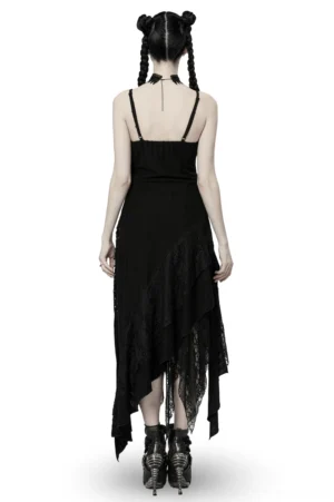 Black asymmetrical pointed gothic dress halter back design with sheer lace panel, rear view on model