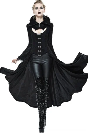 Black gothic long coat front view featuring high spiked collar, embossed jacquard fabric, lace trim, and bat-shaped chest cutout detail on model