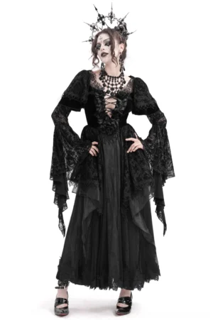 Black Victorian gothic lace maxi dress with dramatic bell sleeves, front lace-up bodice, and ornate lace detailing worn by model in studio setting