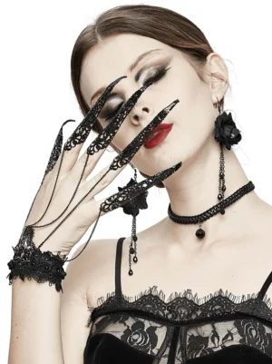 Gothic black lace finger bracelet on female model wearing matching rose earrings and lace choker - dark romantic aesthetic