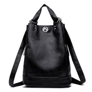 Black PU leather gothic convertible backpack with twist lock closure and side zipper pockets, front overhead view