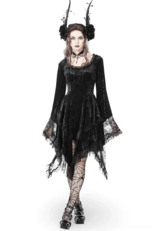 Black velvet asymmetrical gothic dress front view on model with lace bell sleeves and ruffled neckline