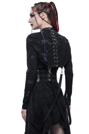 Black gothic cape back view displaying lace-up corset-style closure and detachable harness straps on model