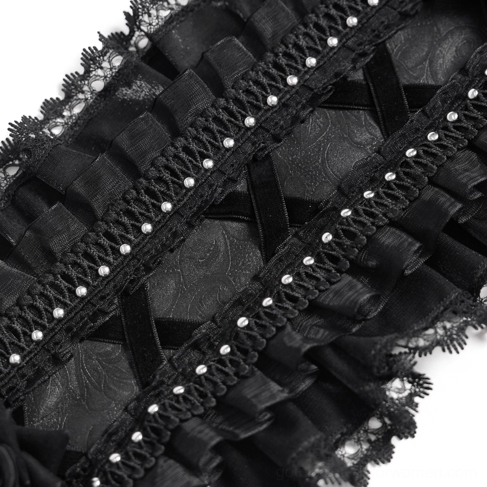Extreme close-up detail shot of gothic bonnet lace showing pearl beaded trim, jacquard fabric texture, and layered ruffles