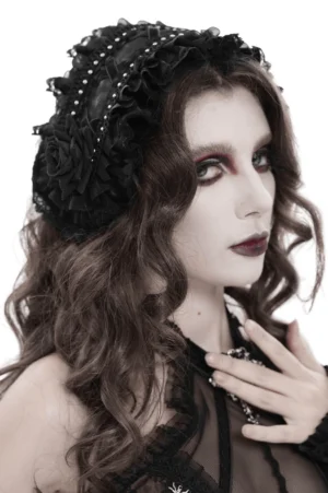 Front close-up of gothic lace bonnet featuring beaded accents, black rose decoration, and intricate ruffled lace trim details