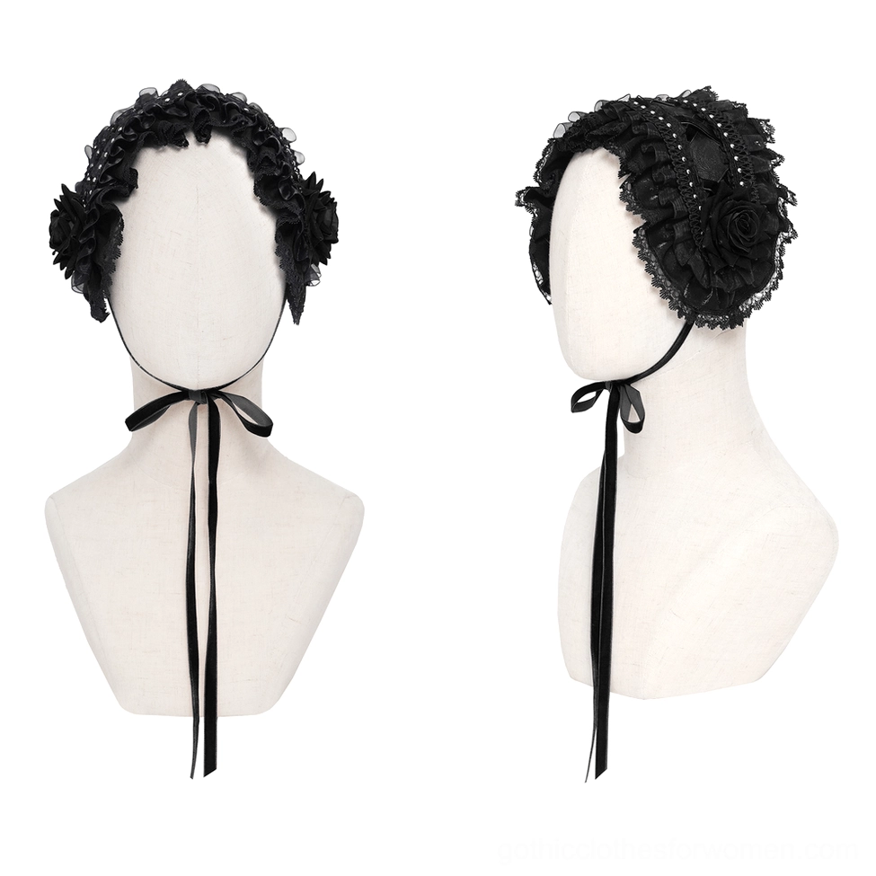 Black gothic lace bonnet on mannequin head, front view showing satin tie straps and delicate lace edge trim